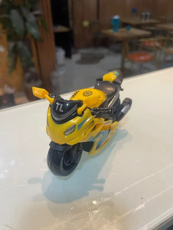 Yellow_And_Black_Toy_Motorcycle