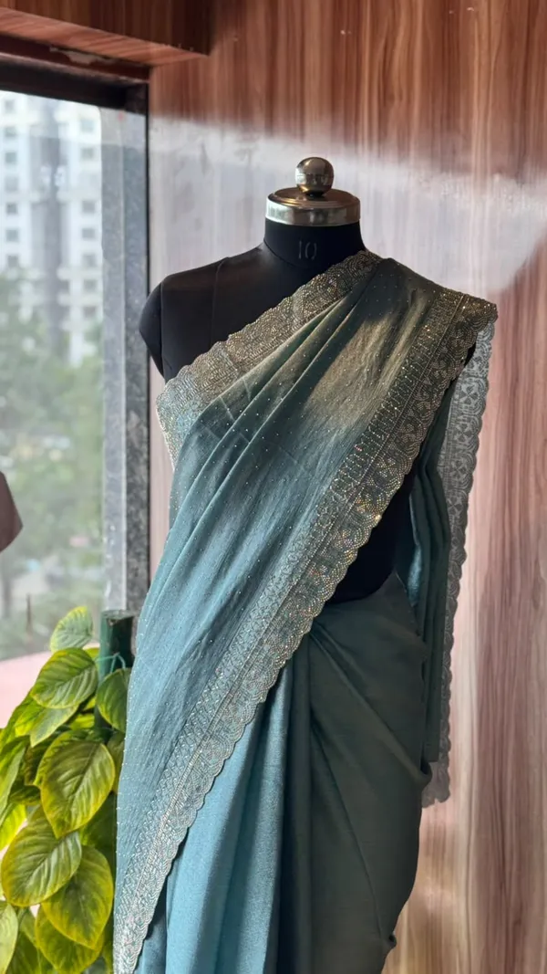 Teal_Net_Metallic_Embellished_Saree_For_Women