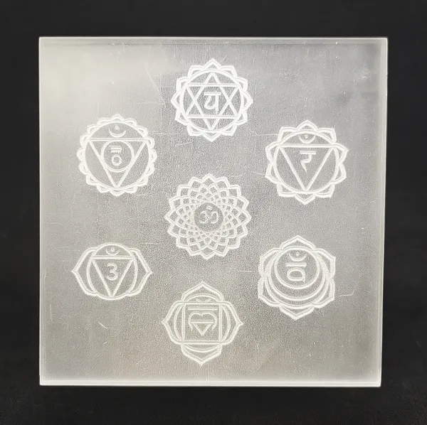Selenite_Crystal_Charging_Plate_With_Chakra_Symbol_engraved,_Weight:_90_To_100_Grams_(3_inch)