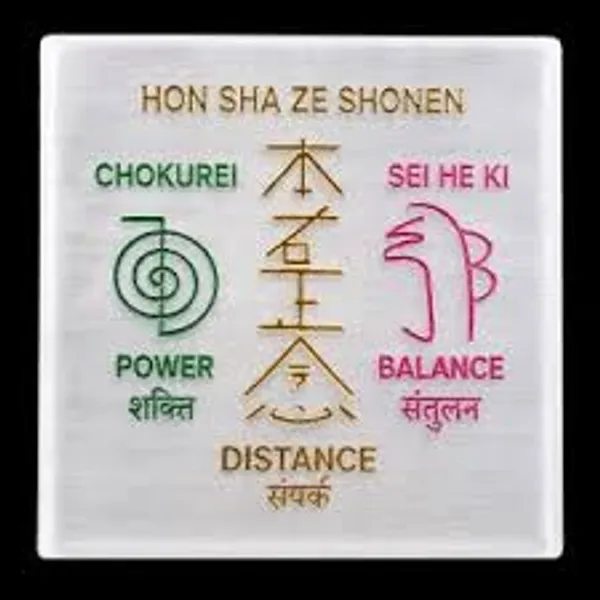 7_Chakra_Selenite_Charging_Plate_featuring_an_engraved_meditating_yoga_figure_surrounded_by_seven_chakra_symbols._(3_inch)