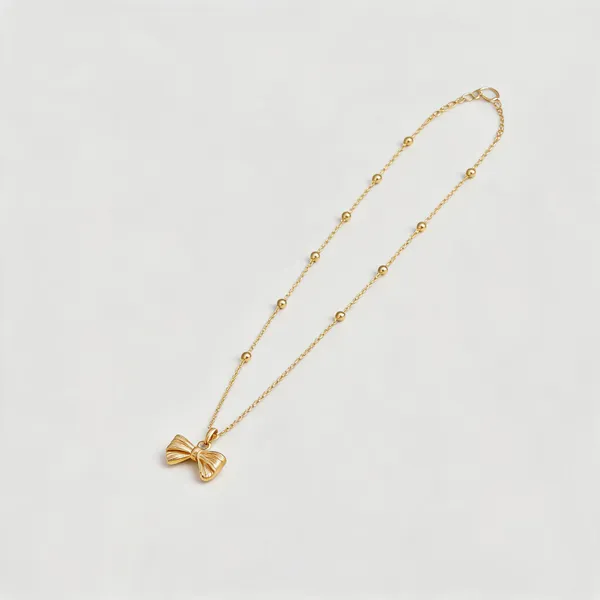 Gold_Stainless_Steel_Bow_Pendant_Necklace_For_Women