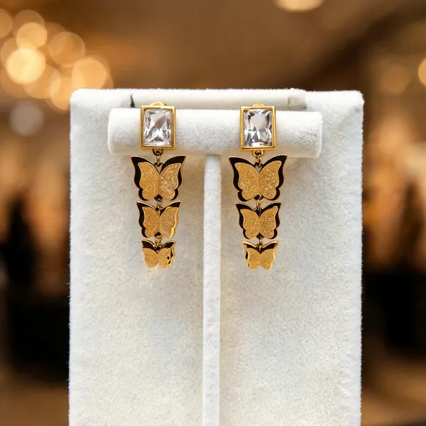 Gold_Metal_Alloy_Butterfly_Motif_Dangling_Drop_Earrings_For_Women