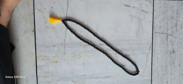 Authentic_Karungali_Mala_(108_Beads)_with_Yellow_Tassel