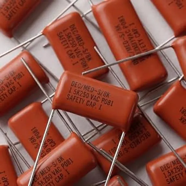 Plastic_Film_Capacitor_Dec_(Med-Sws)_1.5K/250Vac_|_Med_Capacitor_|_Stable_Performance_For_Fan_Regulators,_Power_Supply_&_Electrical_Applications_29*7*12mm