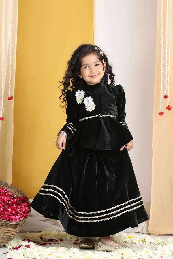 Flattened_Thread_Work_Embroidery_On_The_Peplum_Blouse_With_Gotta_Detailing_On_The_Lehenga_Black