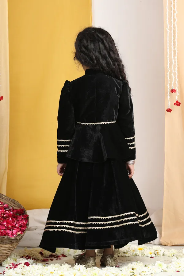 Flattened_Thread_Work_Embroidery_On_The_Peplum_Blouse_With_Gotta_Detailing_On_The_Lehenga_Black