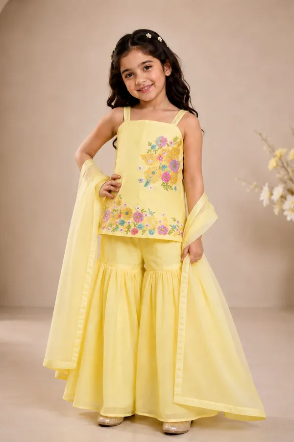 A_Delicate_Yellow_Suit_With_Delicate_Floral_Embroidery_And_Paired_With_Gharara_Butter_Yellow