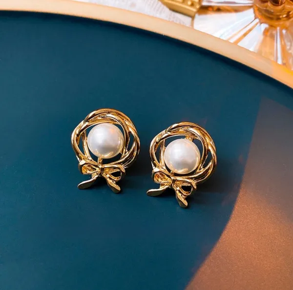 Gold_Alloy_Bow_Stud_Earrings_For_Women_Pack_Of_3