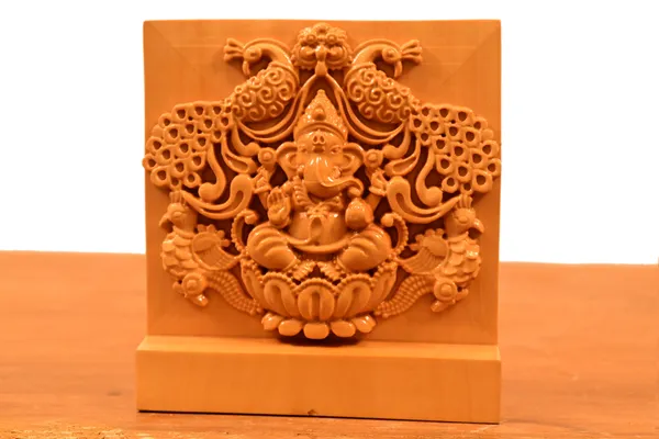 Peacock_Ganpati_Boxwood_Hand-Carved_Wall_Relief_Panel_Light_Cream