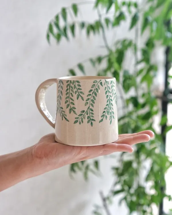 Studio_Pottery_Stoneware_Coffee_Mug_–_Hand-Painted_Leaf_Motif_|_Nature-Inspired_Ceramic_Drinkware