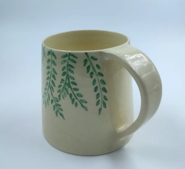 Studio_Pottery_Stoneware_Coffee_Mug_–_Hand-Painted_Leaf_Motif_|_Nature-Inspired_Ceramic_Drinkware