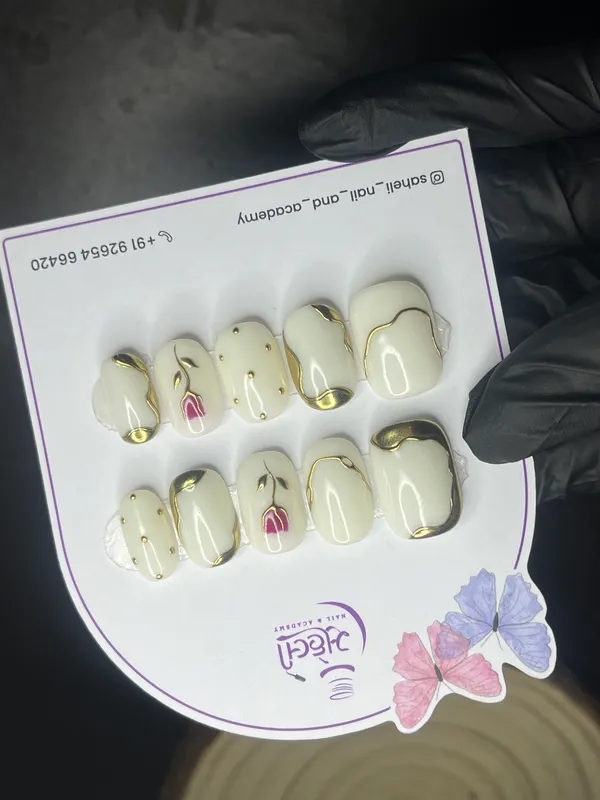 Saheli_Ivory_Gold_Floral_Accent_Glossy_Press-On_Nails