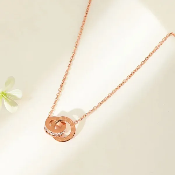 Rose_Gold_Stainless_Steel_Interlocking_Ring_Pendant_Necklace_For_Women