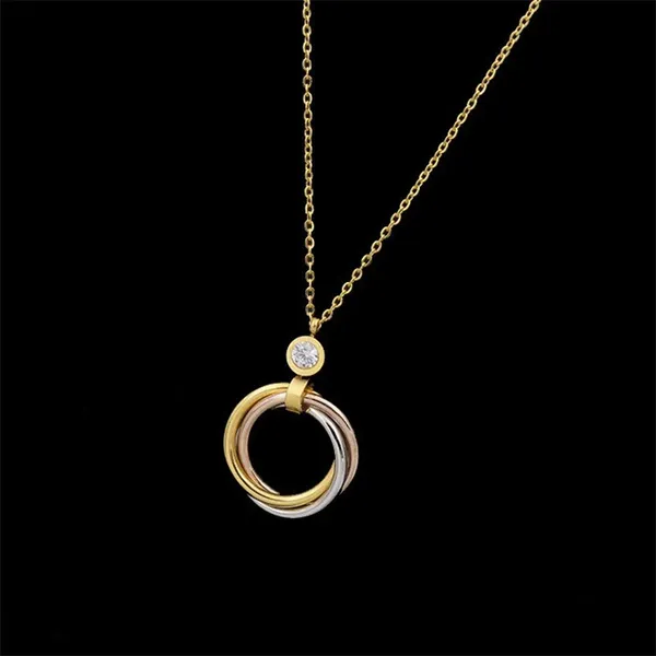 Geometric_Interlocking_Pendant_Necklace_With_Tri_Color_Bands
