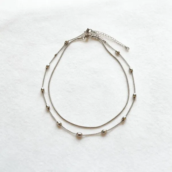Handmade_Necklace_With_Double_Layer_Graceful_Chains_Having_Delicate_Silver_Tone_Bead_Accents_And_A_Sleek_Curved_Silhouette_(Silver)