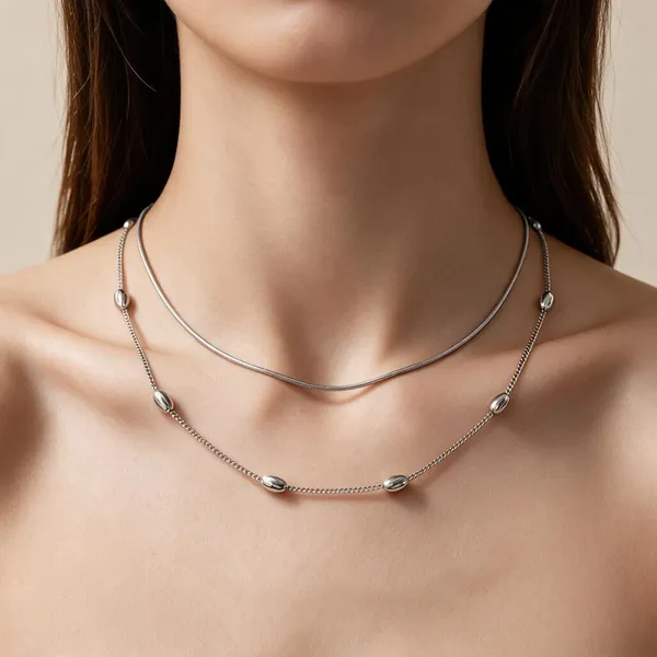 Handmade_Necklace_With_Double_Layer_Graceful_Chains_Having_Delicate_Silver_Tone_Bead_Accents_And_A_Sleek_Curved_Silhouette_(Silver)