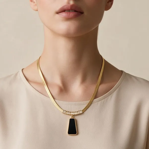 Modern_Necklace_Featuring_Sleek_Herringbone_Chain_Paired_With_Bold_Black_Mother_Of_Pearl_Inlay_Trapezoid_Pendant_Suspended_From_A_Horizontal_Slider_Tube_Accent_Encrusted_With_Sparkling_Pave_Set_Stones_(Gold)