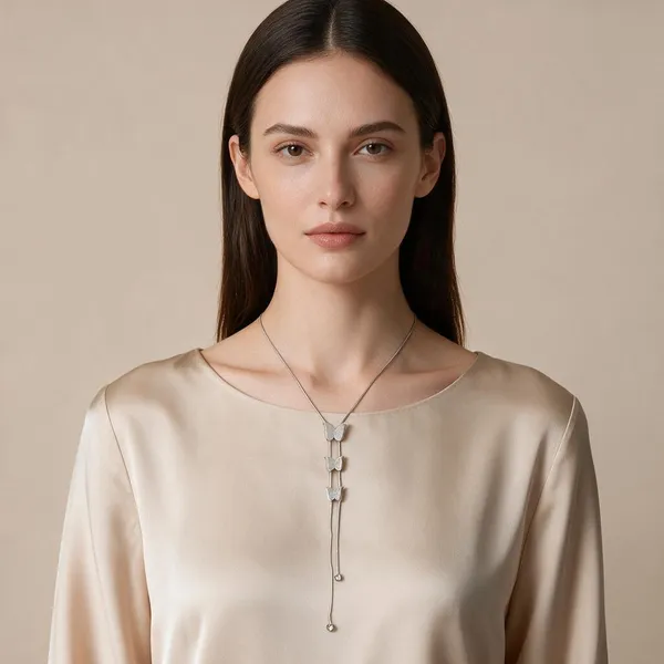 Lariat_Style_Necklace_Featuring_Three_Polished_Silver_Toned_Butterfly_Motifs_Stacked_Sequentially_Along_A_Dual_Strand_Snake_Chain_Drop_(Silver)