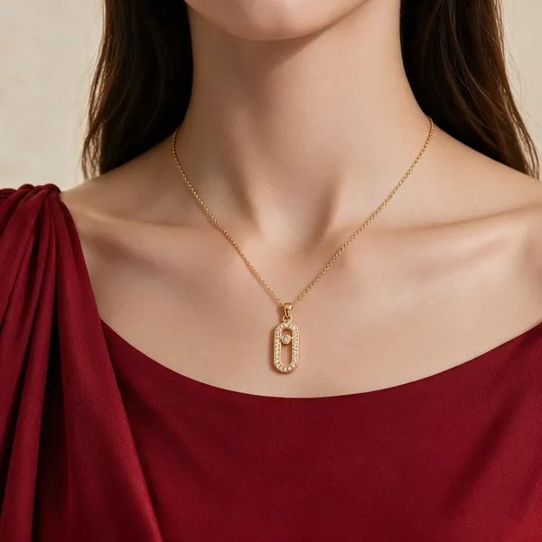 Elegant_Oval_Crystal_Pendant_Necklace_Featuring_a_Gold-tone_Openwork_Frame_and_Sparkling_Crystal_Details_(Gold)