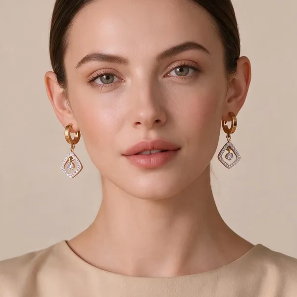 Openwork_Diamond_Shaped_Drop_Huggie_Earrings_Featuring_A_Modern_Geometric_Silhouette_With_A_Floating_Bezel_Set_Cubic_Zirconia_Stone_Surrounded_By_A_Shimmering_Pave_Inlay_(Rose_Gold)