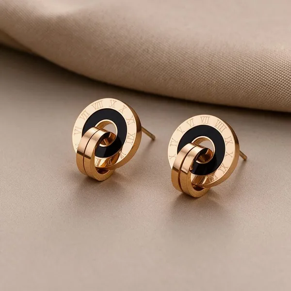 Modern_Stud_Earrings_Featuring_A_Circular_Disc_Design_With_Engrave_Style_Roman_Numerals_And_A_Contrasting_Black_Acrylic_Inlay_(Rose_Gold)
