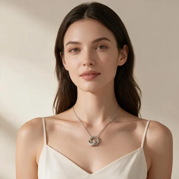 Interlocking_Double_Ring_Necklace_With_Etched_Roman_Numerals_And_Shimmering_Pave_Set_Micro_Crystals_(Silver)
