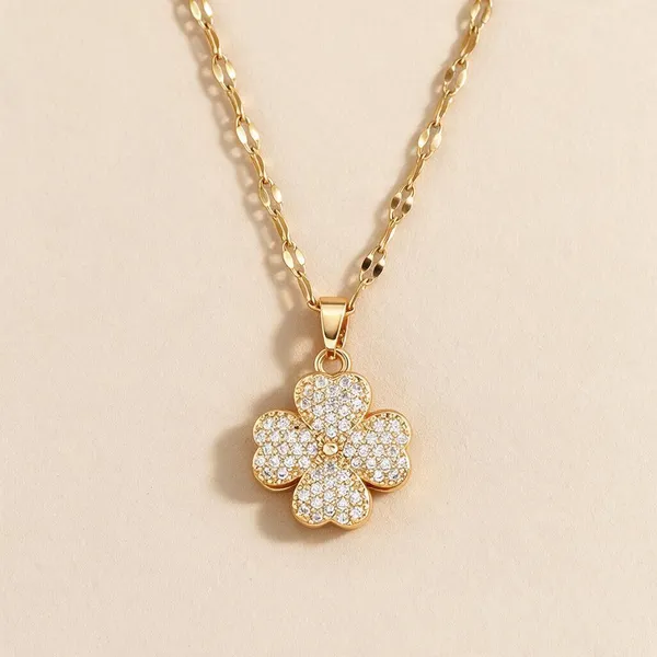 Four_Leaf_Clover_Pendant_Necklace_Featuring_Four_Distinct_Heart_Shaped_Leaves_Pave_Set_With_Dazzling_Clear_Rhinestones_Suspended_From_A_Decorative_Gold_Toned_Chain_(Gold)