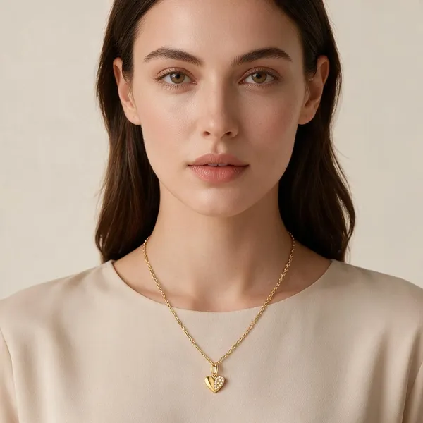 Split_Design_Heart_Motif_Styled_As_A_Minimal_Rounded_Shell_Like_Geometry_Offering_A_Playful_Tortoise_Inspired_Silhouette_(Gold)