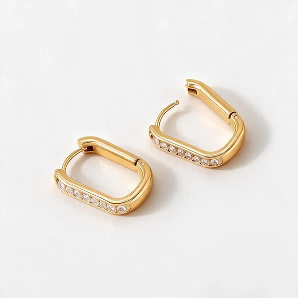 Sleek_Elongated_Rectangular_Modern_Huggie_Hoop_Earrings_Designed_With_A_Secure_Click_Top_Clasp,_Front_Edge_Is_Set_With_Achannel_Of_Sparkling_Clear_Rhinestones_(Gold)