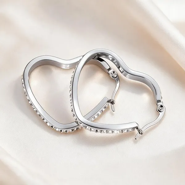 Romantic_Hoop_Earrings_Feature_An_Open_Heart_Silhouette_Lined_With_A_Sparkling_Channel_Of_Pavé_Set_Clear_Cubic_Zirconia_Crystals_(Silver)