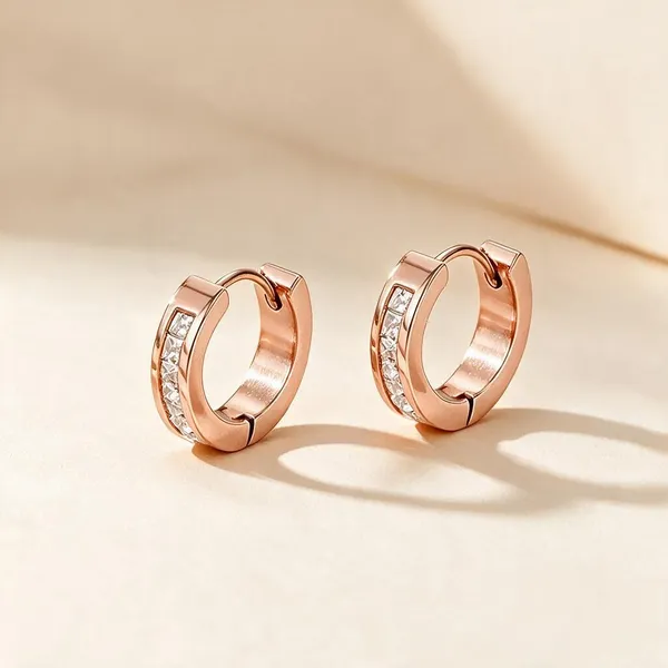 Sleek,_Classic_Geometric_Circular_Huggie_Hoop_Earrings_Lined_With_A_Channel_Of_Brilliant_Clear_Cubic_Zirconia_Rhinestones_(Rose_Gold)