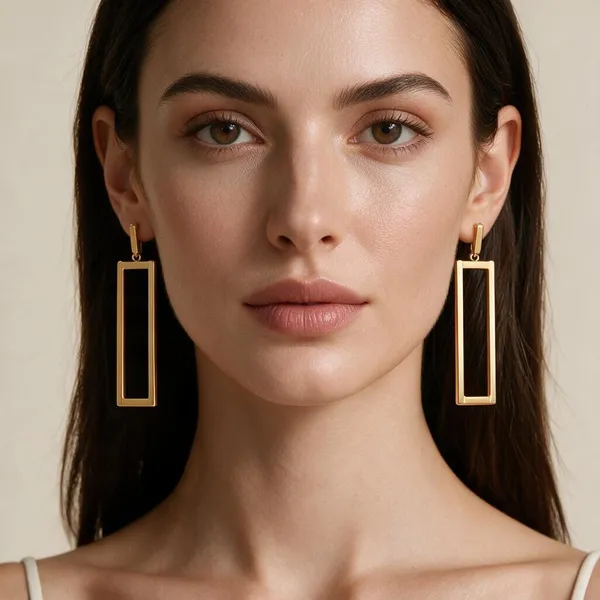 Modern_Geometric_Hanging_Earrings_Feature_A_Sleek,_Open_Hollow_Rectangle_Drop_Suspended_Directly_From_Linear_Post_Pins_(Gold)
