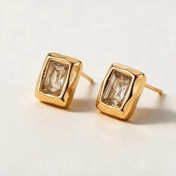 Modern_Clean_Geometric_Frame_Stud_Earrings_Combined_With_Step_Cut_Faceting_Featuring_A_Bezel_Set,_Emerald_Cut_5A_Clear_Zircon_Gemstone_(Gold)