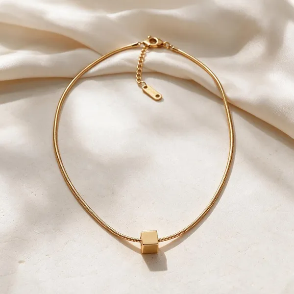 Sliding_3D_Cube_Bead_Pendant_Suspended_On_A_Sleek,_Snag_Free_Flexible_Snake_Chain_(Gold)