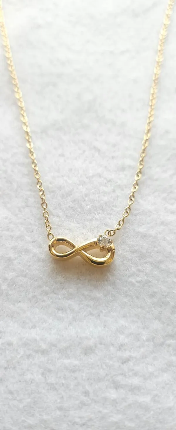 Gold_Steel_Infinity_Symbol_Solitaire_Pendant_Necklace_For_Women