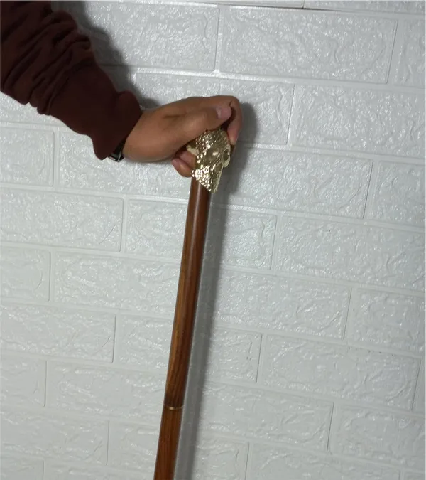 Wooden_Foldable_Walking_Stick_With_Brass_Skull_Handle_36_Inch_Unique_And_Durable_Cane_With_Comfortable_Grip_Lightweight_Design_Ideal_For_Daily_Use_Easy_To_Store_And_Carry