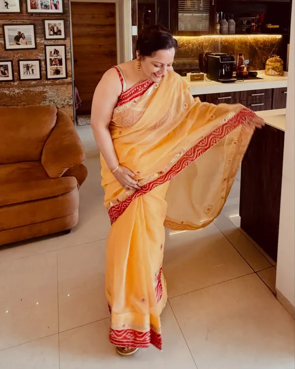Mango_Yellow_Kota_Doria_Saree_With_Red_Bandhej_Border_Gotta_Patti_Work