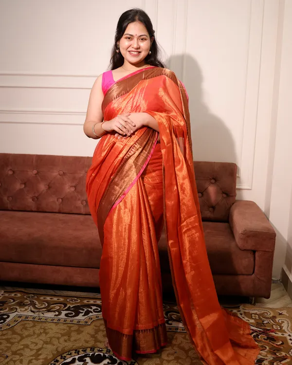 Mul_Tissue_Saree_With_Temple_Border_Orange