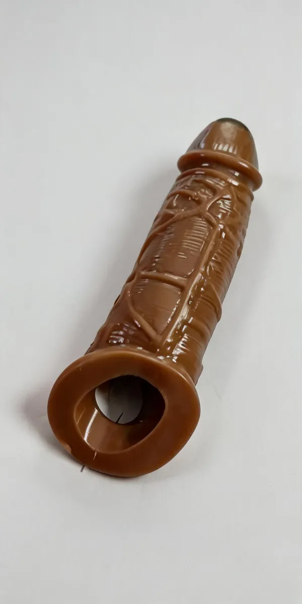 Realistic_Brown_Silicone_Wearable_Adult_Accessory_with_Textured_Design_and_Open-Loop_Base