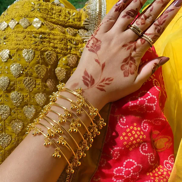 Gold_Tone_Floral_Charm_Bangles_Set_For_Women
