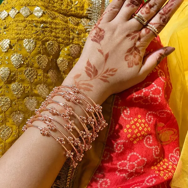 Gold_Tone_Floral_Charm_Bangle_Set_For_Women