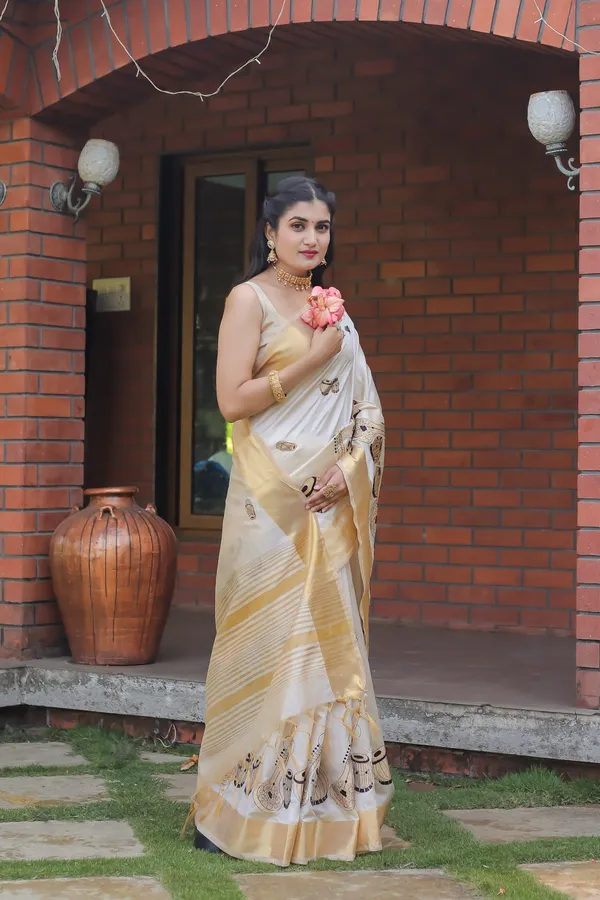 Off_White_Assam_Silk_Musical_Instrument_Motif_Saree_For_Women