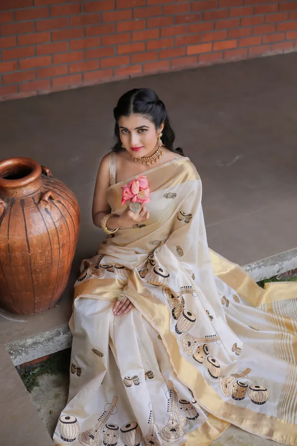 Off_White_Assam_Silk_Musical_Instrument_Motif_Saree_For_Women