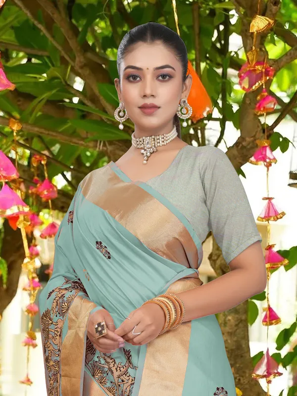 Powder_Blue_Matka_Silk_Forest_Scene_Motif_Saree_For_Women