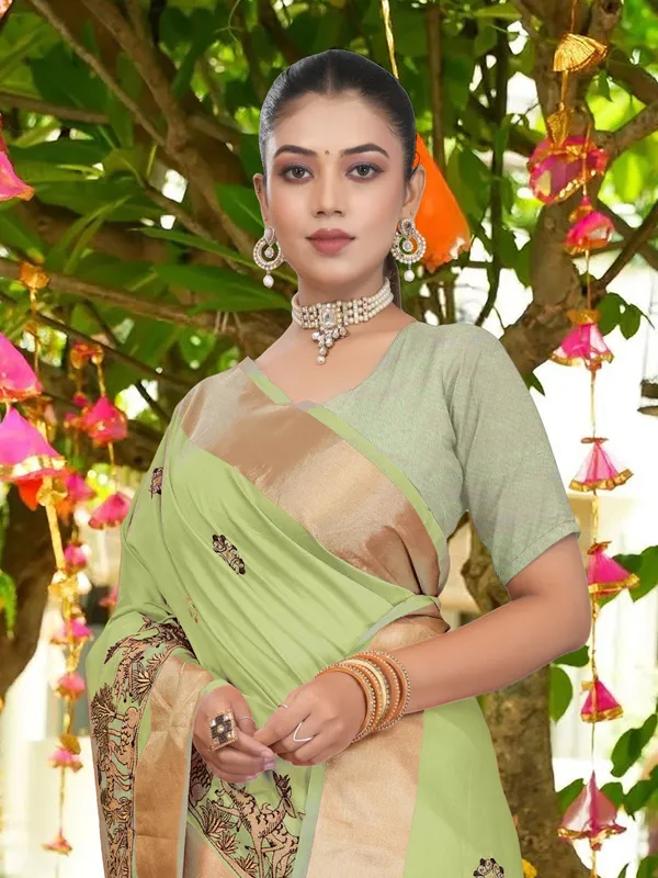 Light_Green_Matka_Silk_Forest_Scene_Motif_Saree_For_Women