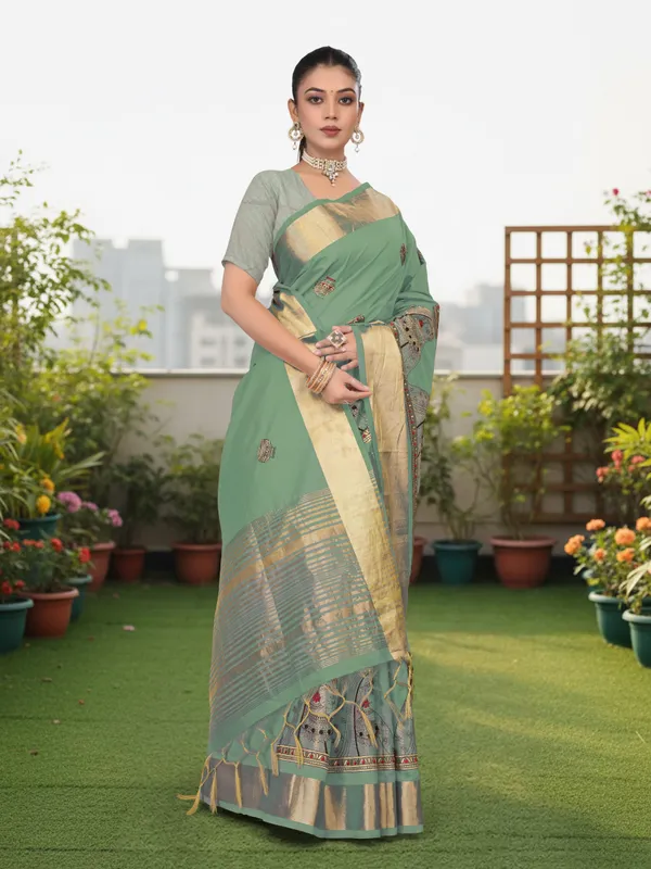 Deep_Green_Matka_Silk_Portrait_Motif_Saree_For_Women