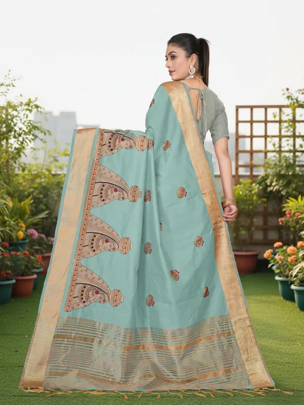 Powder_Blue_Matka_Silk_Portrait_Motif_Saree_For_Women