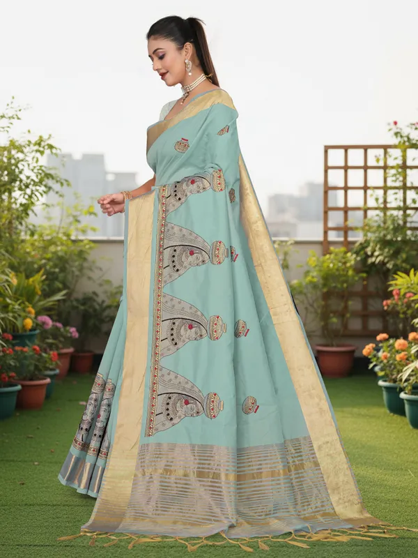 Powder_Blue_Matka_Silk_Portrait_Motif_Saree_For_Women