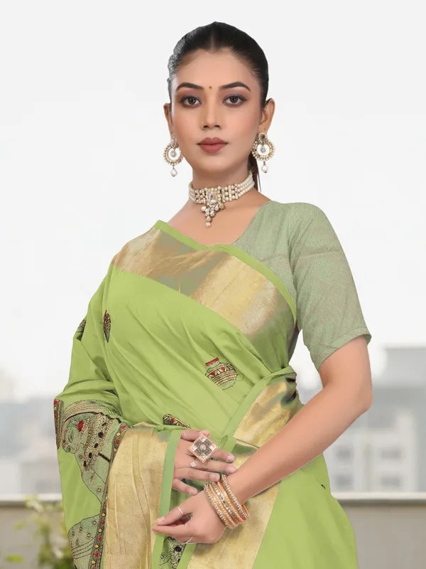 Light_Green_Matka_Silk_Portrait_Motif_Saree_For_Women