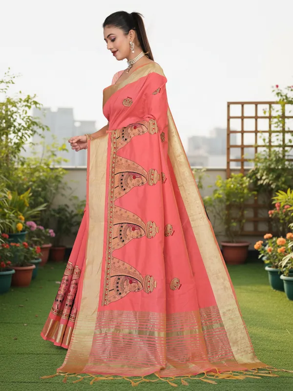 Coral_Pink_Matka_Silk_Portrait_Motif_Saree_For_Women